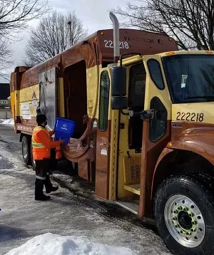 image of new waste collection truck and driver