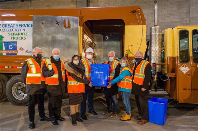 Markham Mayor Frank Scarpitti and City Councillors unveil new recycling-only trucks.