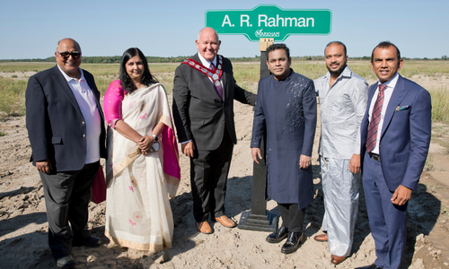 Mayor Frank Scarpitti, Councillor Khalid Usman, A.R. Rahman and members of delegation on-site at future A.R. Rahman Street location.